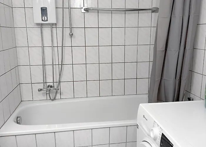 With 2 Individual Beds And Sleeping Sofa And Kitchen Essen