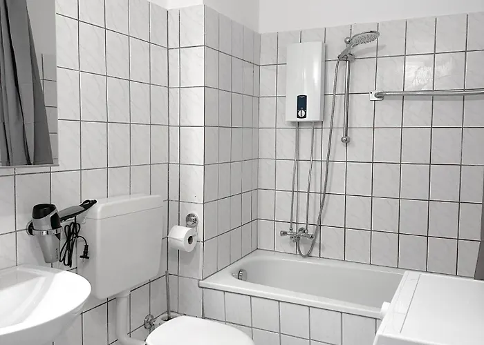 With 2 Individual Beds And Sleeping Sofa And Kitchen